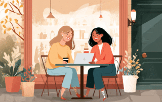 Two women sitting at a cozy coffee shop table, laughing and sharing a laptop, symbolizing support, accountability, and financial empowerment